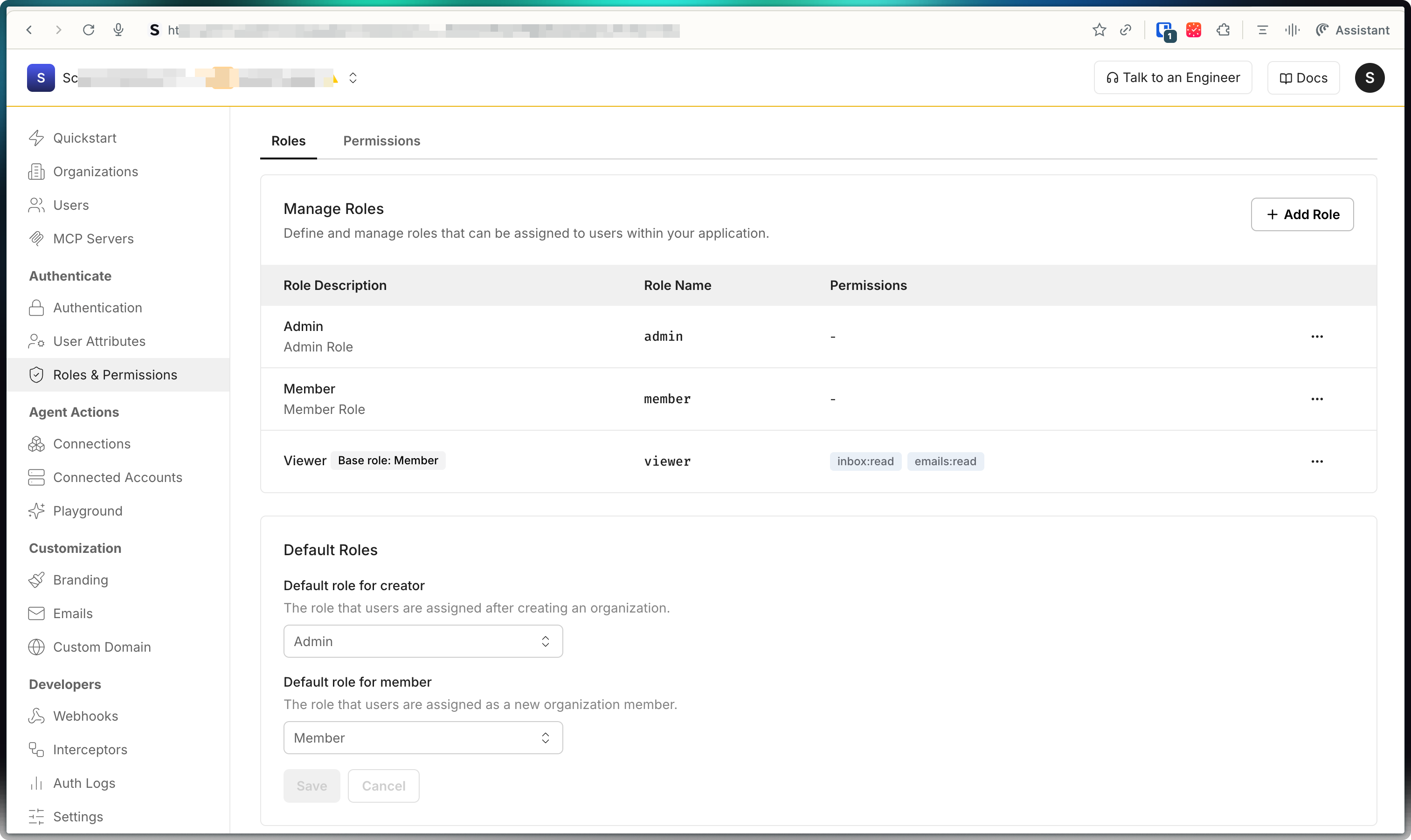Scalekit dashboard Roles & Permissions page showing the Manage Roles table with admin, member, and viewer roles and a Default Roles panel